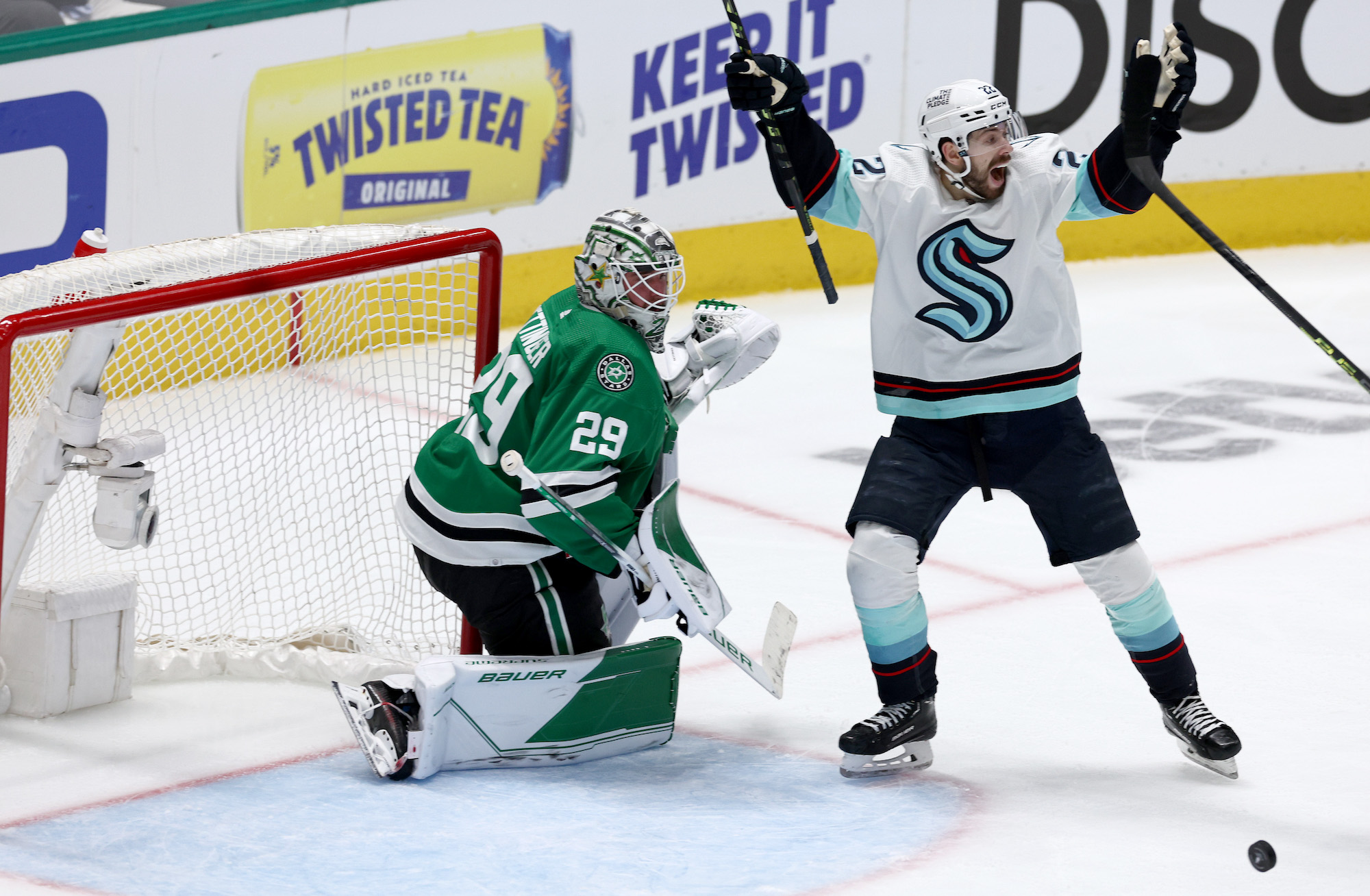 DALLAS, TEXAS - MAY 02: Oliver Bjorkstrand #22 of the Seattle Kraken celebrates after Yanni Gourde #37 of the Seattle Kraken scored the game-winning goal against Jake Oettinger #29 of the Dallas Stars in the first overtime period in Game One of the Second Round of the 2023 Stanley Cup Playoffs at American Airlines Center on May 02, 2023 in Dallas, Texas. (Photo by Tom Pennington/Getty Images)