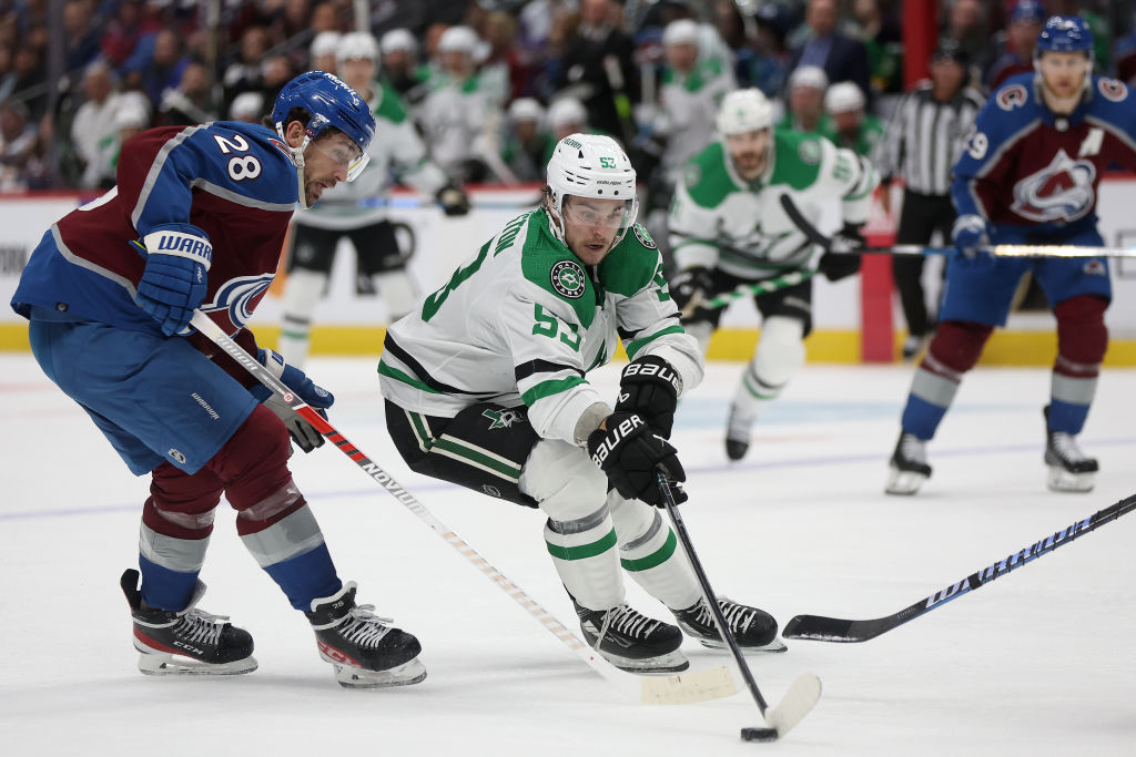 Wyatt Johnston skates with the puck