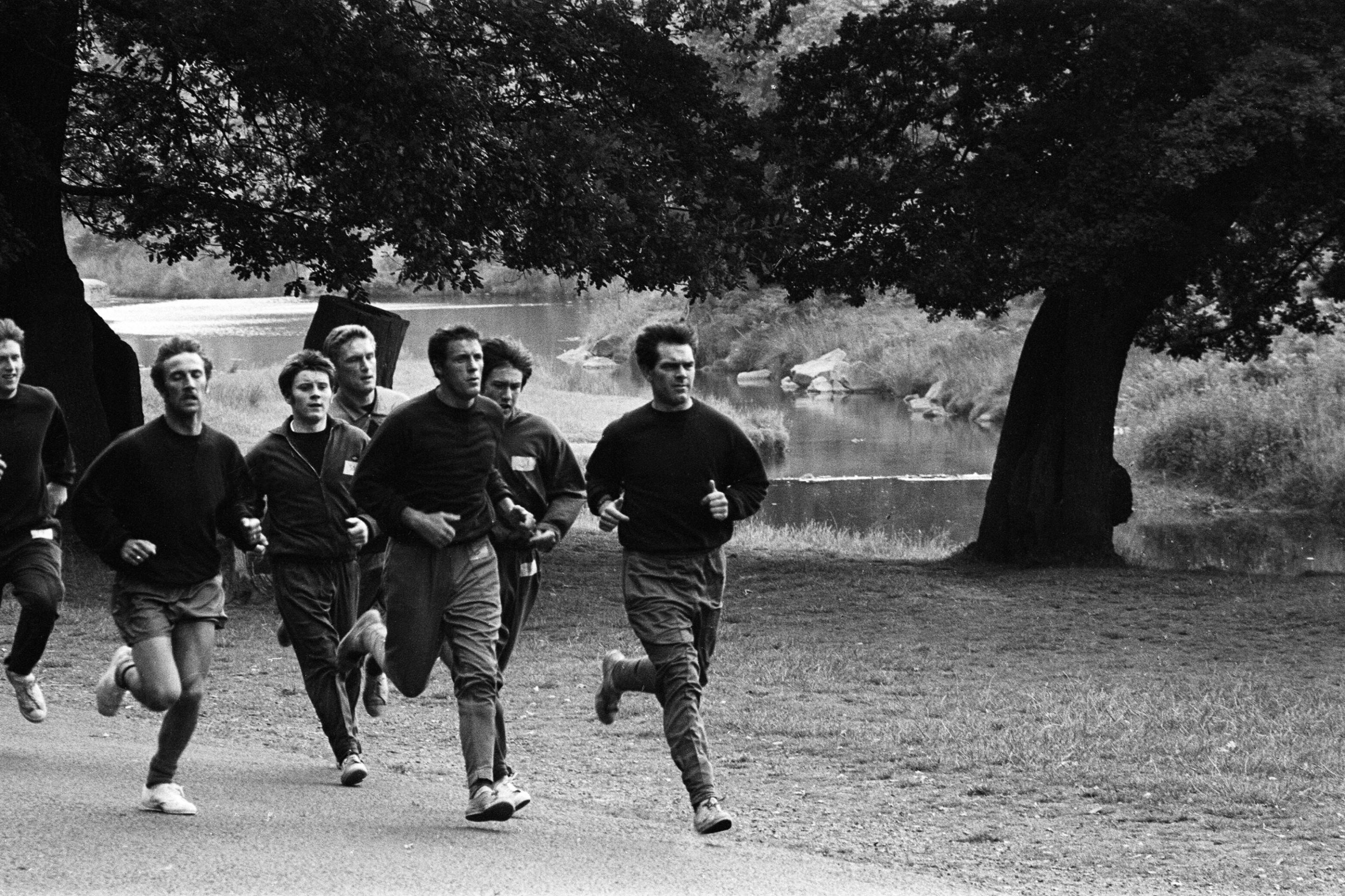 Men running in the countryside