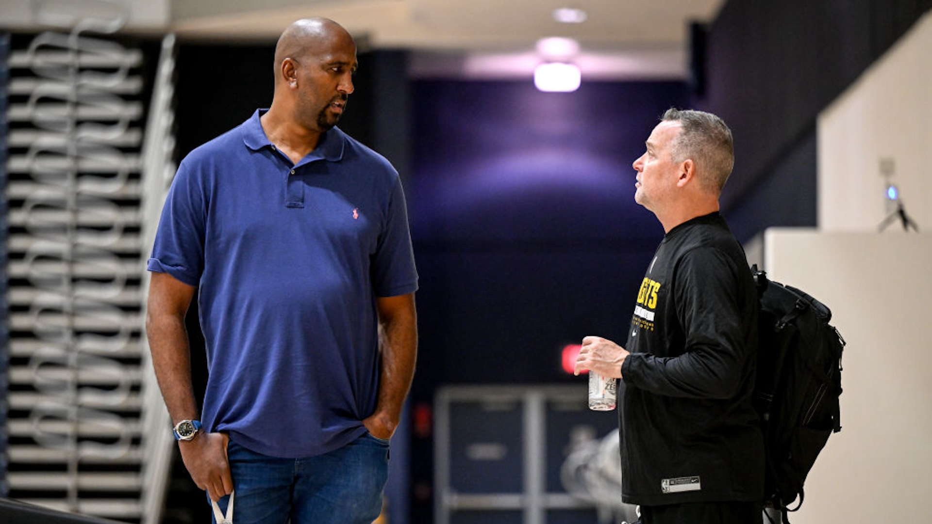 Denver Nuggets head coach Michael Malone and general manager Calvin Booth speak during the teams training camp at the UCSD campus in La Jolla, California on Thursday, September 28, 2022.