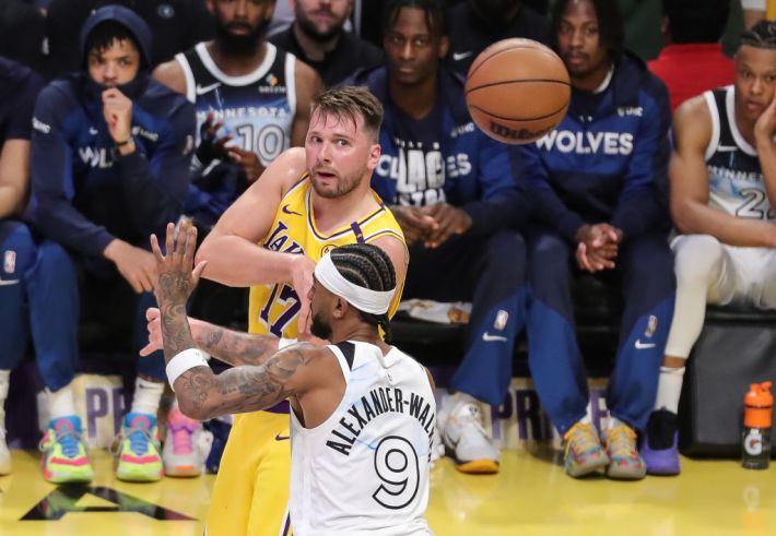 Los Angeles Lakers guard Luka Doncic (77) with cross court over the shoulder pass during the NBA game between the Minnesota Timberwolves and the Los Angeles Lakers on February 27, 2025, at Crypto.com Arena in Los Angeles, CA.