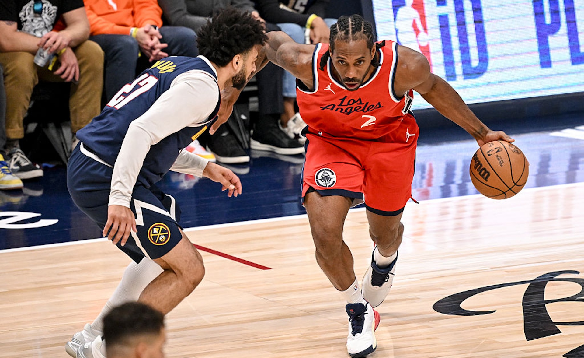 Kawhi Leonard (2) of the LA Clippers drives on Jamal Murray (27) of the Denver Nuggets during the first quarter at Ball Arena in Denver, Colorado on Saturday, April 19, 2025.