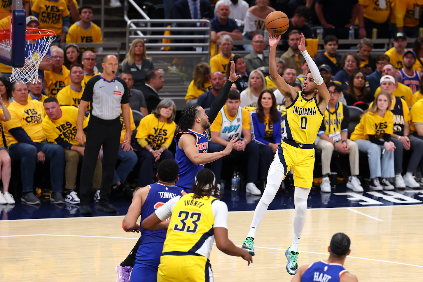Tyrese Haliburton #0 of the Indiana Pacers attempts a jump shot against Jalen Brunson #11 of the New York Knicks during the fourth quarter in Game Four of the Eastern Conference Finals of the 2025 NBA Playoffs on May 27, 2025 in Indianapolis, Indiana.