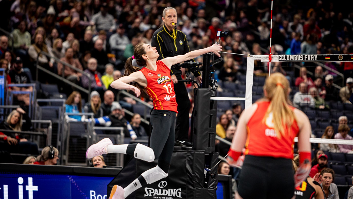 Megan Courtney-Lush jumps for a ball.